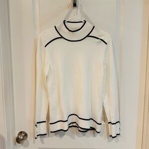 Elegant White Turtleneck Sweater with Black Trim